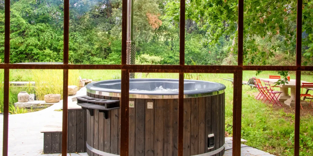 belle eco reviews. wood fired hot tub at French wedding venue