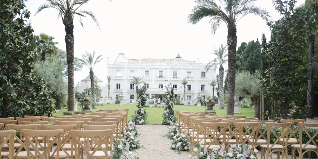 Grand chateau wedding - Chateau Hermitage de Combas. Wedding aisle, chairs, and a beautiful white chateau. 