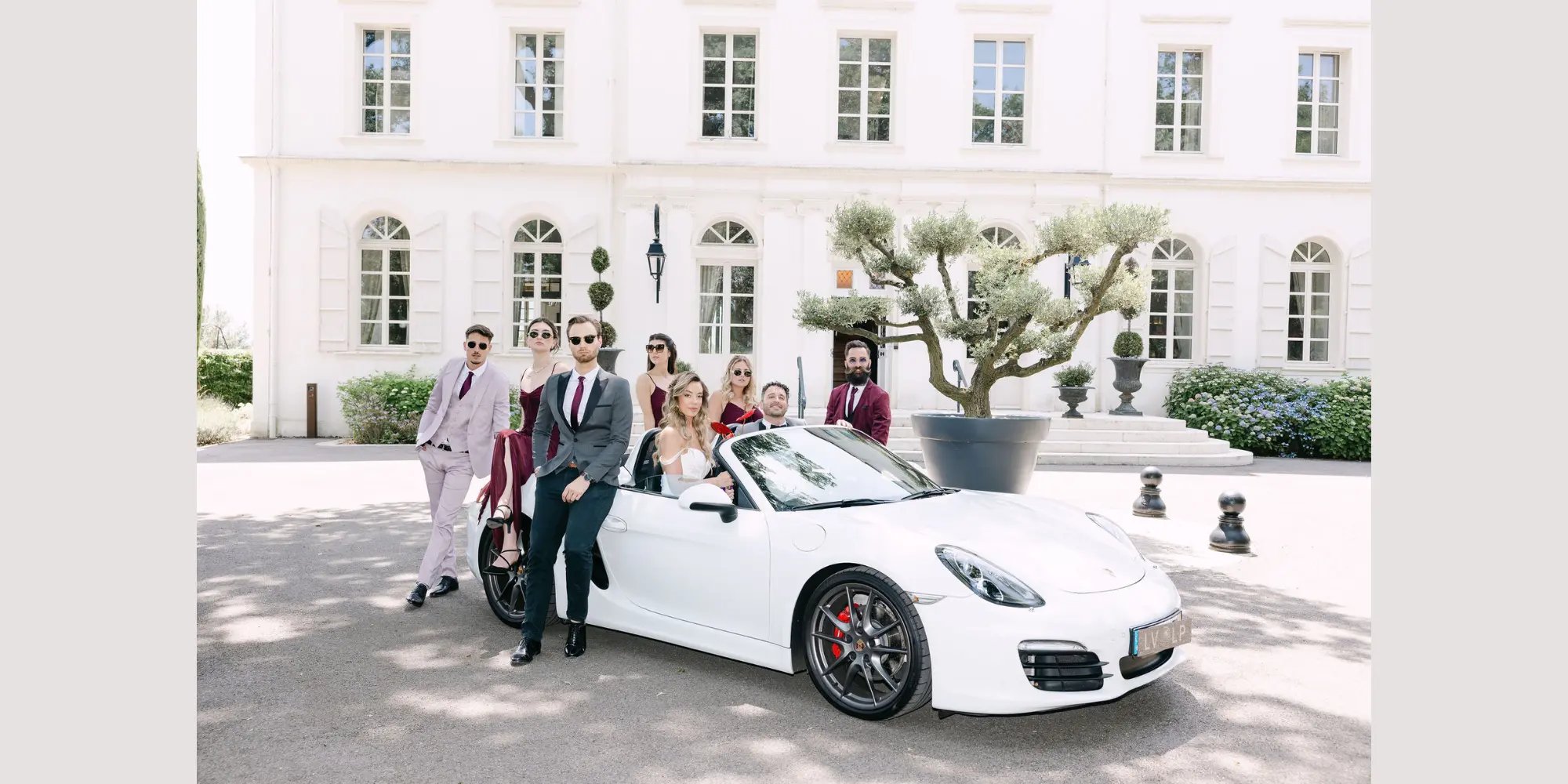 Wedding party outside beautiful chateau des pyrenees